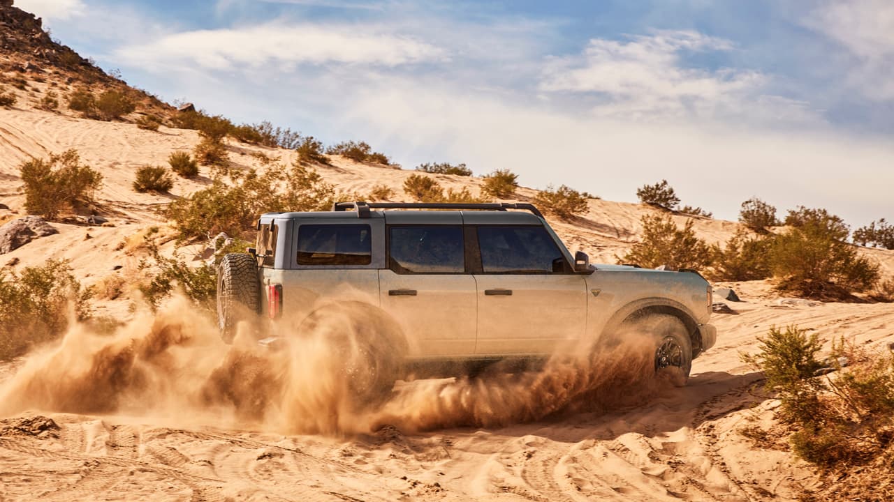 Pre-production 2021 four-door Bronco Badlands in Cactus Gray with available Sasquatch™ off-road package.