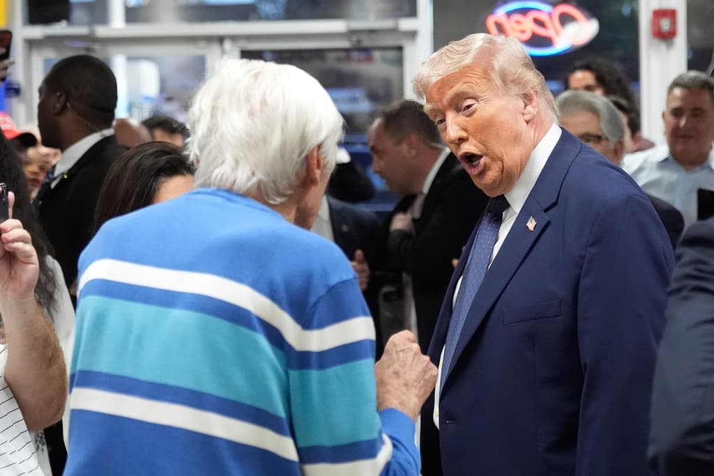 President Donald Trump speaks as he visits Venezuelan restaurant El Arepazo, Monday, March 9, 2026, in Doral, Fla. (AP Photo/Mark Schiefelbein)