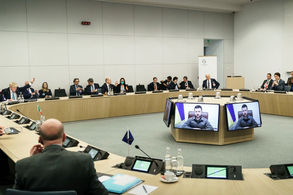 British Prime Minister Boris Johnson, German Chancellor Olaf Scholz, U.S. President Joe Biden and Canada's Prime Minister Justin Trudeau look on during a video call with Volodymyr Zelensky, President of Ukraine, during a NATO summit on Russia's invasion of Ukraine, at the alliance's headquarters in Brussels, on March 24, 2022 in Brussels, Belgium.