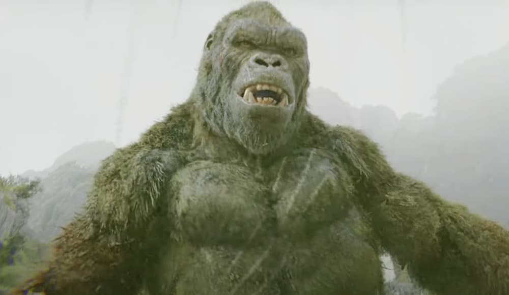 King Kong a punto de peleas contra un dinosaurio