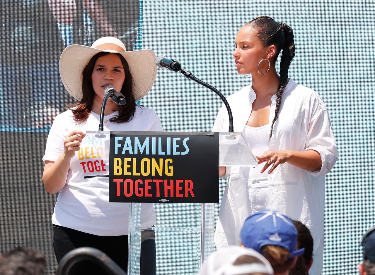 WASHINGTON, DC - JUNE 30: Artists America Ferrera (L) and Alicia Keys read from affidavits from families that have been separated from their children during a rally with MoveOn, National Domestic Workers Alliance, and hundreds of allies at the White House to tell President Donald Trump and his administration to stop separating kids from their parents on June 30, 2018 in Washington, DC.Ê Families belong together, and we need to end this -- now. The group then marched and surrounded the Department of Justice to bring the message to Attorney General Jeff Sessions that zero tolerance must end. Every day, this administration is cruelly separating children from their families. They have proven that whether it's at the border or in detention, we can't trust them to care for children. (Photo by Paul Morigi/Getty Images for MoveOn.org)