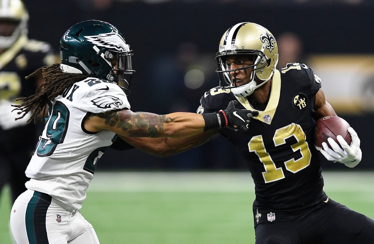 New Orleans Saints wide receiver Michael Thomas (13) carries on a 42-yard reception against Philadelphia Eagles free safety Avonte Maddox (29) in the first half of an NFL divisional playoff football game in New Orleans, Sunday, Jan. 13, 2019. (AP Photo/Bill Feig)
