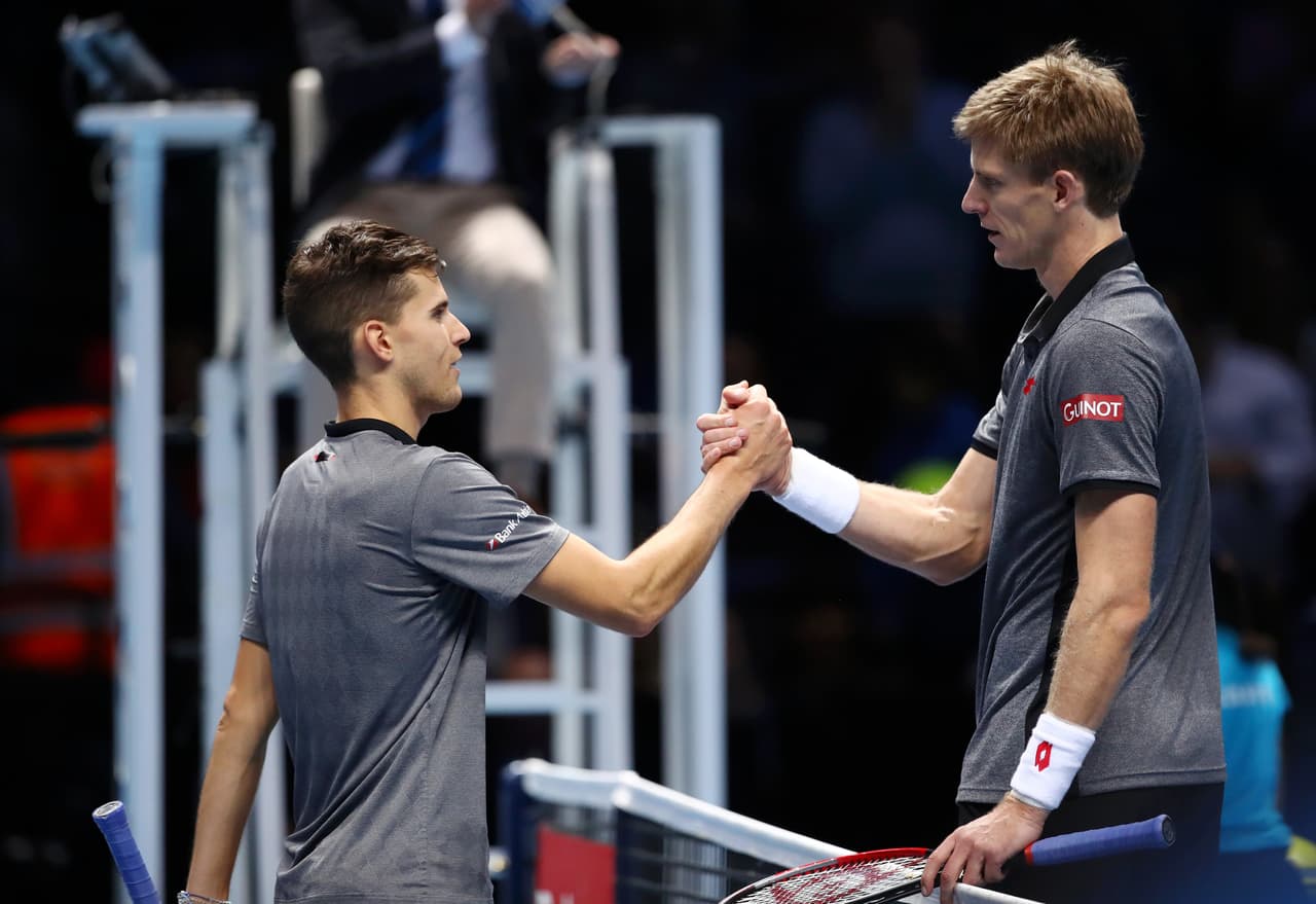LONDON, ENGLAND - NOVEMBER 11: Dominic Thiem of Austria shakes hands with Kevin Anderson of South Africa after Kevin Anderson wins their match during Day One of the Nitto ATP World Tour Finals at The O2 Arena on November 11, 2018 in London, England. (Photo by Clive Brunskill/Getty Images)