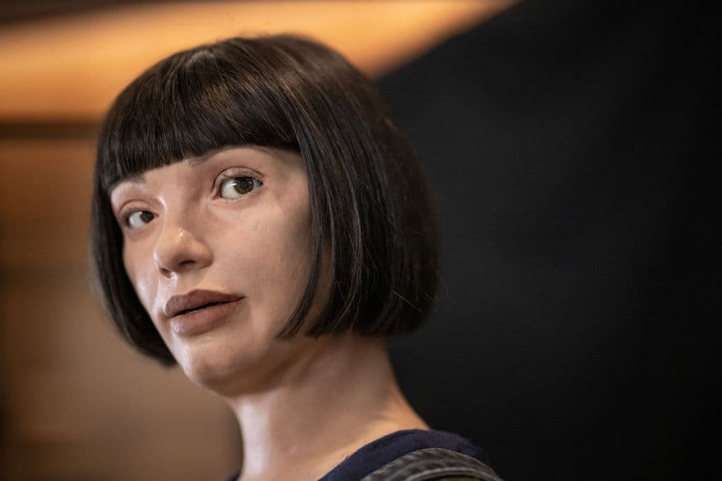 Ultra-realistic artist robot "Ai-Da" looks on during the world's largest gathering of humanoid AI Robots as part of International Telecommunication Union (ITU) AI for Good Global Summit in Geneva, on July 5, 2023. The United Nations is convening this week a global gathering to try to map out the frontiers of artificial intelligence and to harness its potential for empowering humanity, hoping to lay out a clear blueprint on the way forward for handling AI, as development of the technology races ahead the capacity to set its boundaries. (Photo by Fabrice COFFRINI / AFP) (Photo by FABRICE COFFRINI/AFP via Getty Images)