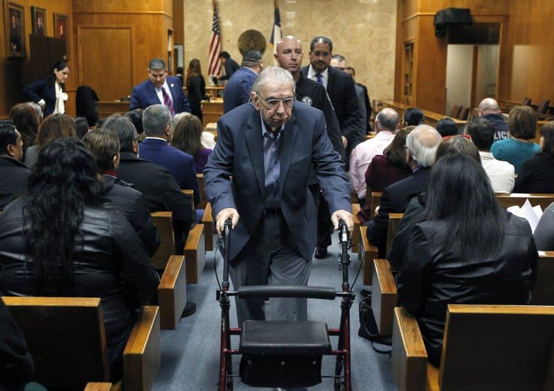 Former priest John Feit leaves the courtroom following closing arguments in his murder trial, Thursday, Dec. 7, 2017, at the Hidalgo County Courthouse in Edinburg, Texas. Feit was on trial for the murder of Ireen Garza in April 1960.