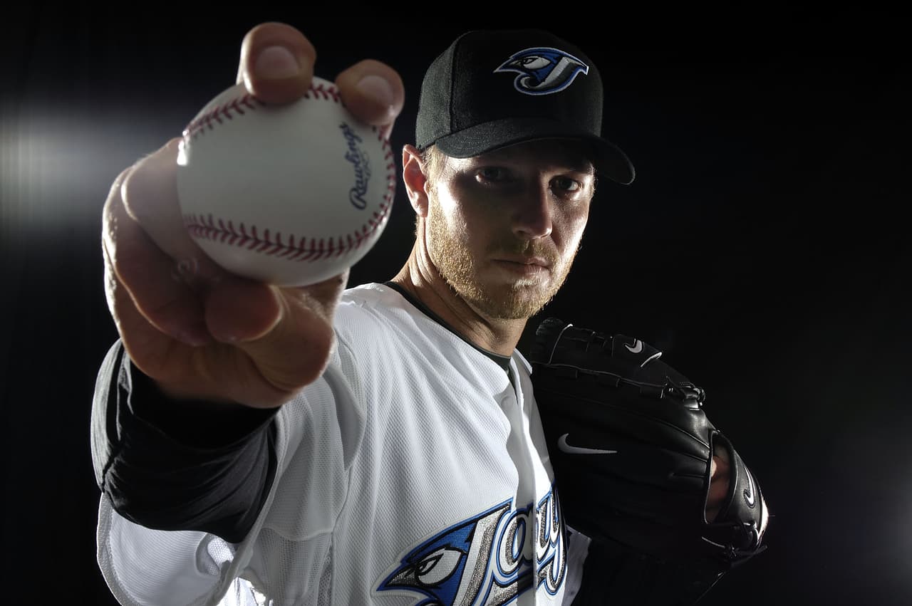 DUNEDIN, FL - FEBRUARY 22: Pitcher Roy Halladay #32 of the Toronto Blue Jays poses for a photo on media day during spring training at the Bobboy Mattix Traing Center February 22, 2008 in Dunedin, Florida. (Photo by Marc Serota/Getty Images)