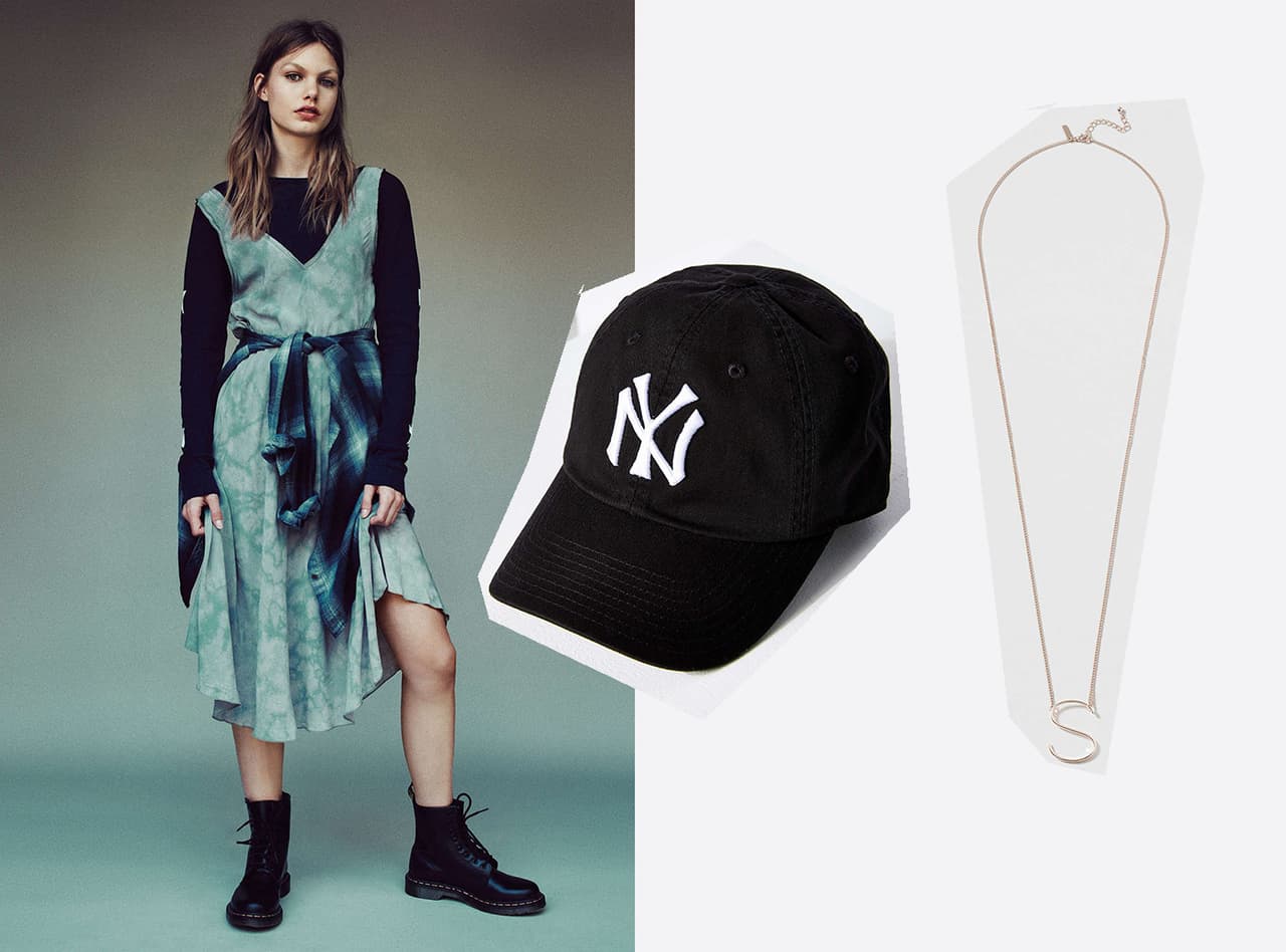 El estilo de Abbi e Ilana, amigas también en la vida real, es imposible de definir. En la serie compran su ropa en mercadillos de segunda mano y son apasionadas de las rebajas. Podríamos verls perfectamente con este vestido de Topshop, y esta gorra de American Needle disponible en Urban Outfitters, igual que el collar. | Imágenes: Topshop, Urban Outfitters