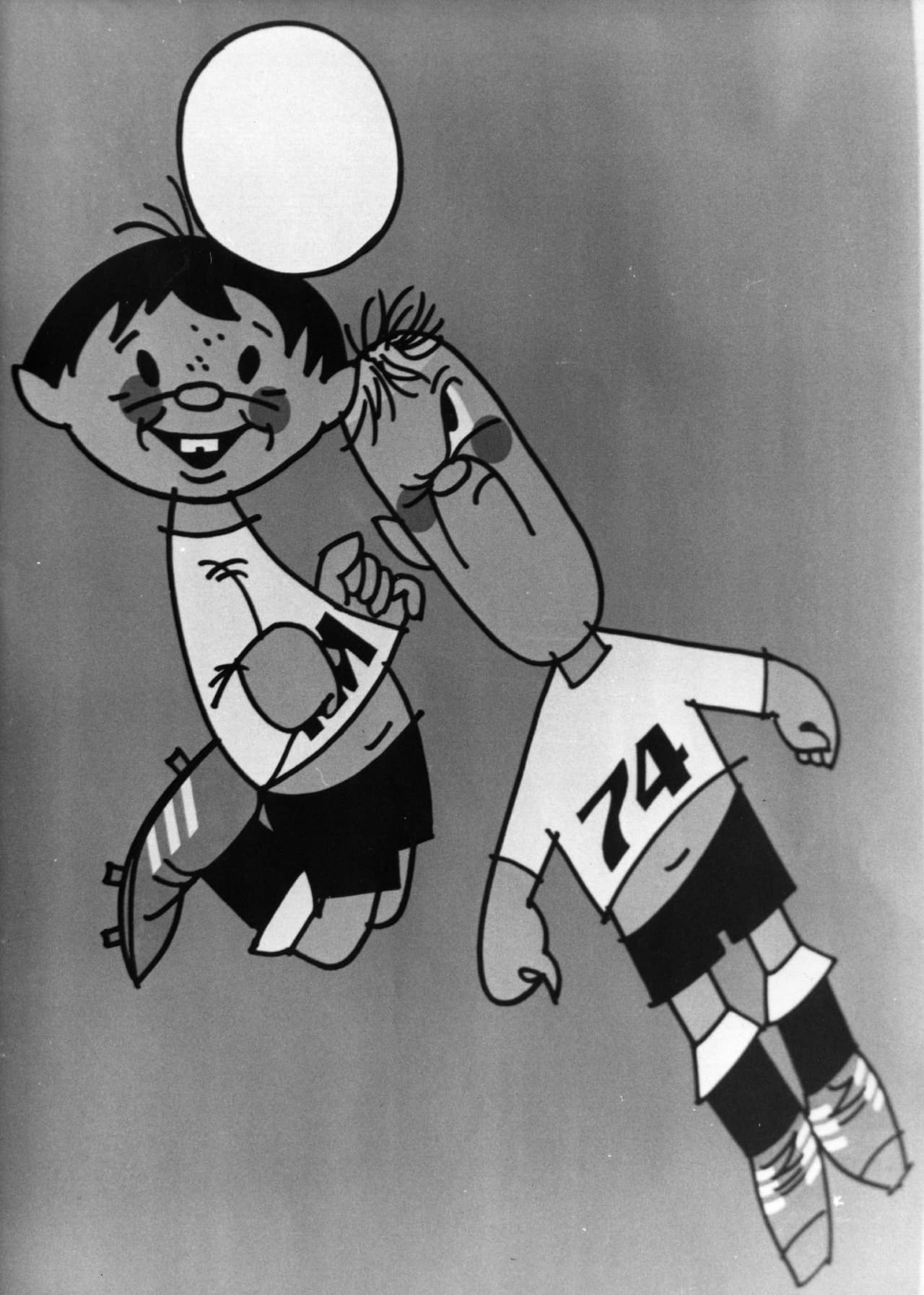 <b>Tip y Tap - Alemania 74</b>
<br>Una idea similar a la México 70. Dos niños con la camiseta de Alemania. Uno de ellos con las letras WM, (siglas de la Copa Mundial en aquel idioma) y la otra con el número 74.