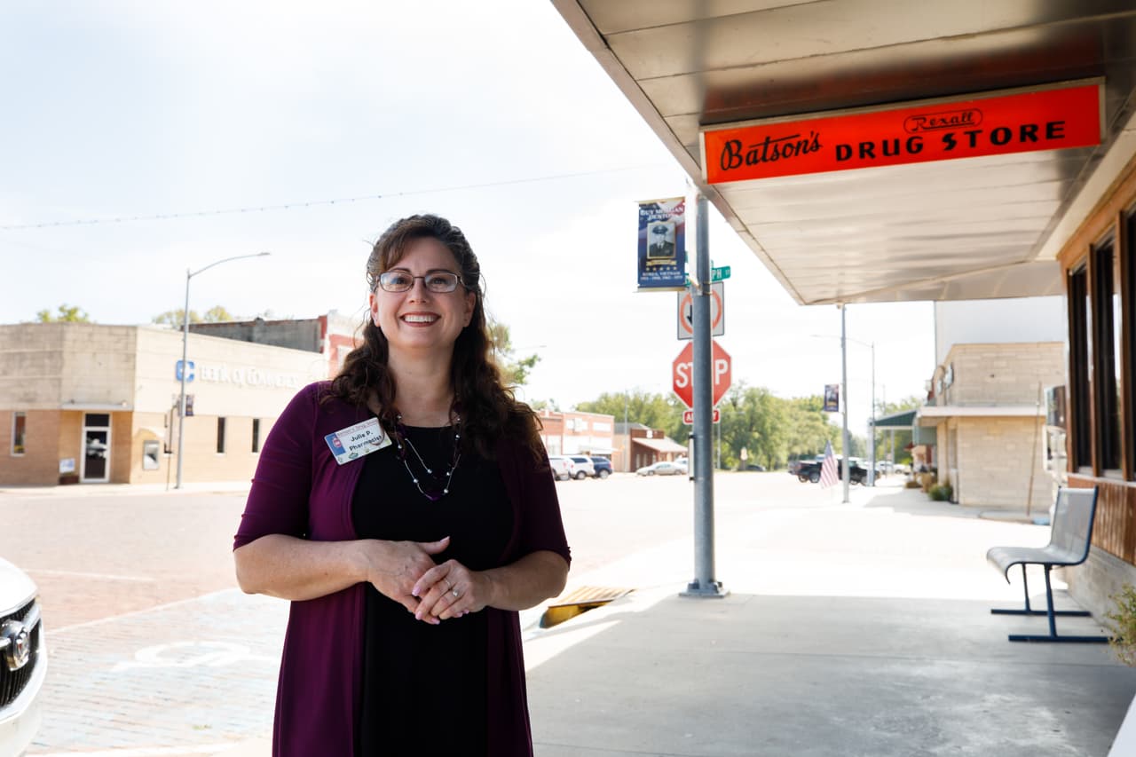 Julie Perkins bought Batson’s — the only drugstore in Elk County, Kansas — after graduating from pharmacy school. As a lifelong resident of county seat Howard, population 650, Perkins knows pretty much everyone there. (Gavin Peters for KHN)