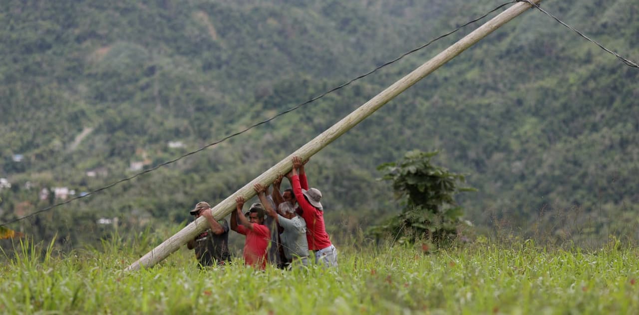Some Puerto Ricans had to restore downed power lines themselves after Hurricane Maria.
