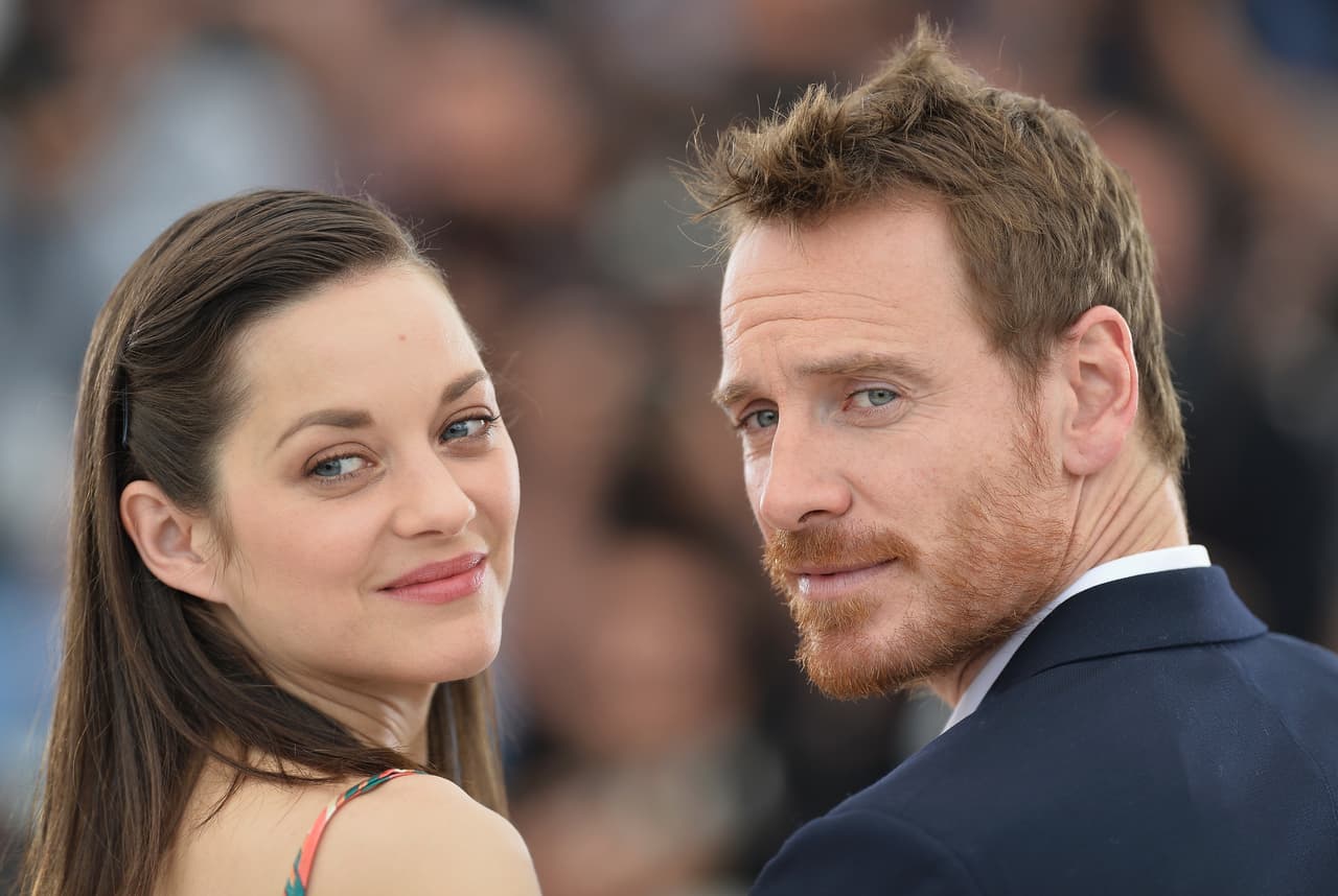 Carita de: "Sí, estoy al lado de la hermosa Marion Cotillard. Grrr."