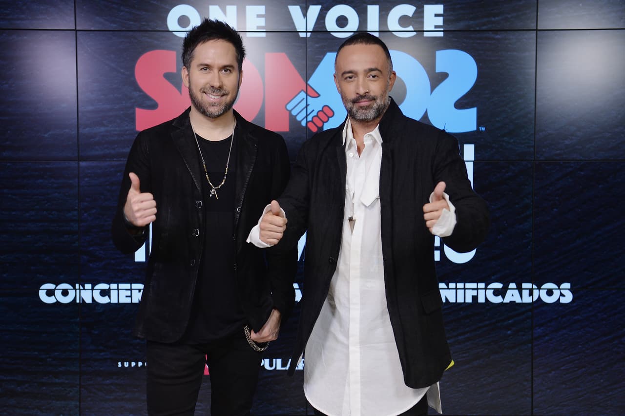 MIAMI, FL - OCTOBER 14: In this handout photo provided by One Voice: Somos Live!, Pablo Hurtado and Mario Domm of 'Camila' pose in the pressroom at One Voice: Somos Live! A Concert For Disaster Relief at Marlins Park on October 14, 2017 in Miami, Florida. (Photo by Jason Koerner/One Voice: Somos Live!/Getty Images)