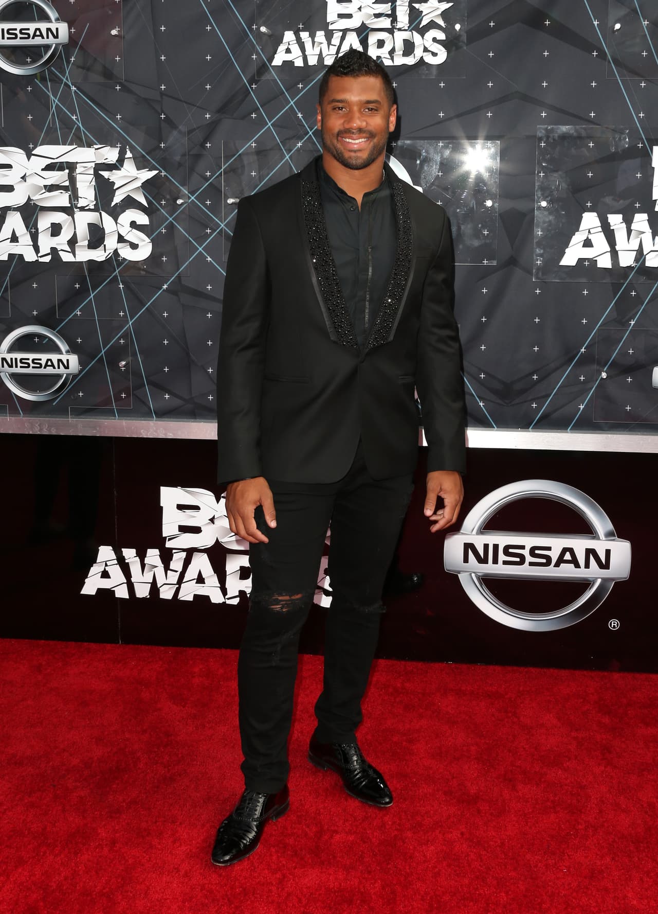 Aunque no lo crean, el mariscal de campo de Seattle, Russell Wilson, sabe de estilo y de buena moda.