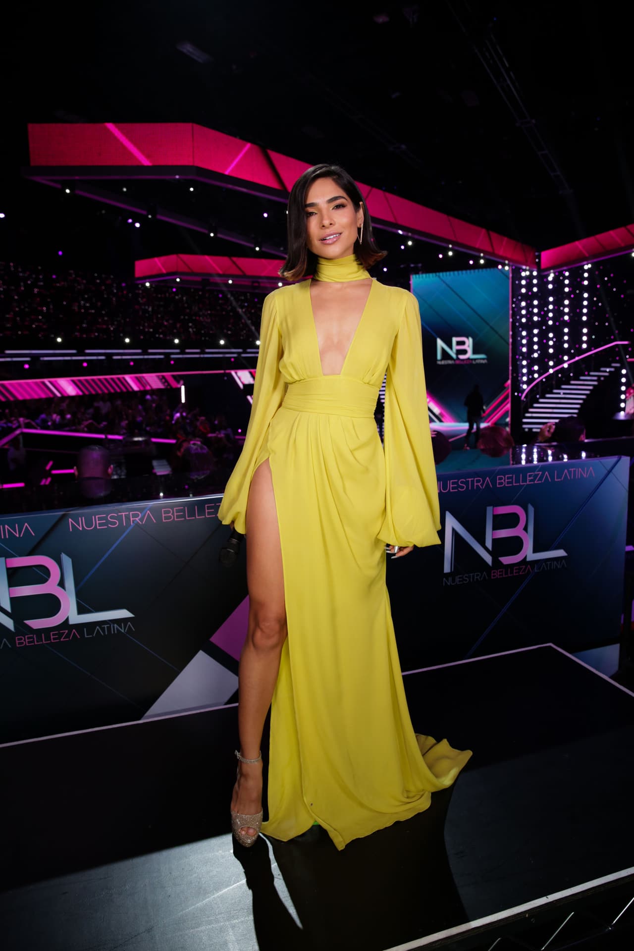 <b>Gala 3</b>: Para la quinta gala, la conductora del reality show lució un maravilloso vestido amarillo de
<b><a href="https://www.instagram.com/stello/">Stello</a></b> que nos recordó a los modelos elegidos por Jennifer Lopez.