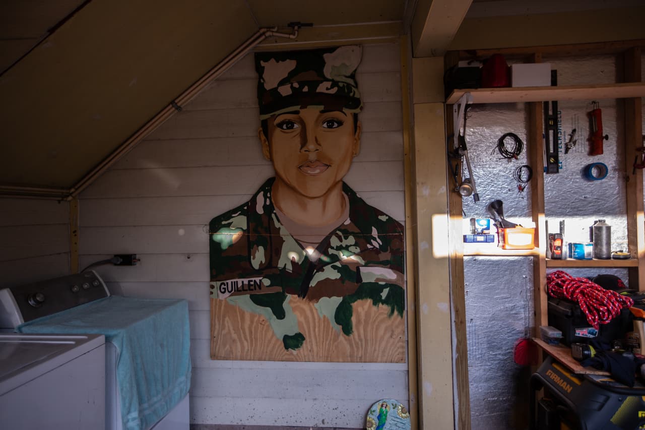 A mural of Vanessa painted on wood hangs in the backyard of the Guillen family home in Houston, Texas.
<br>