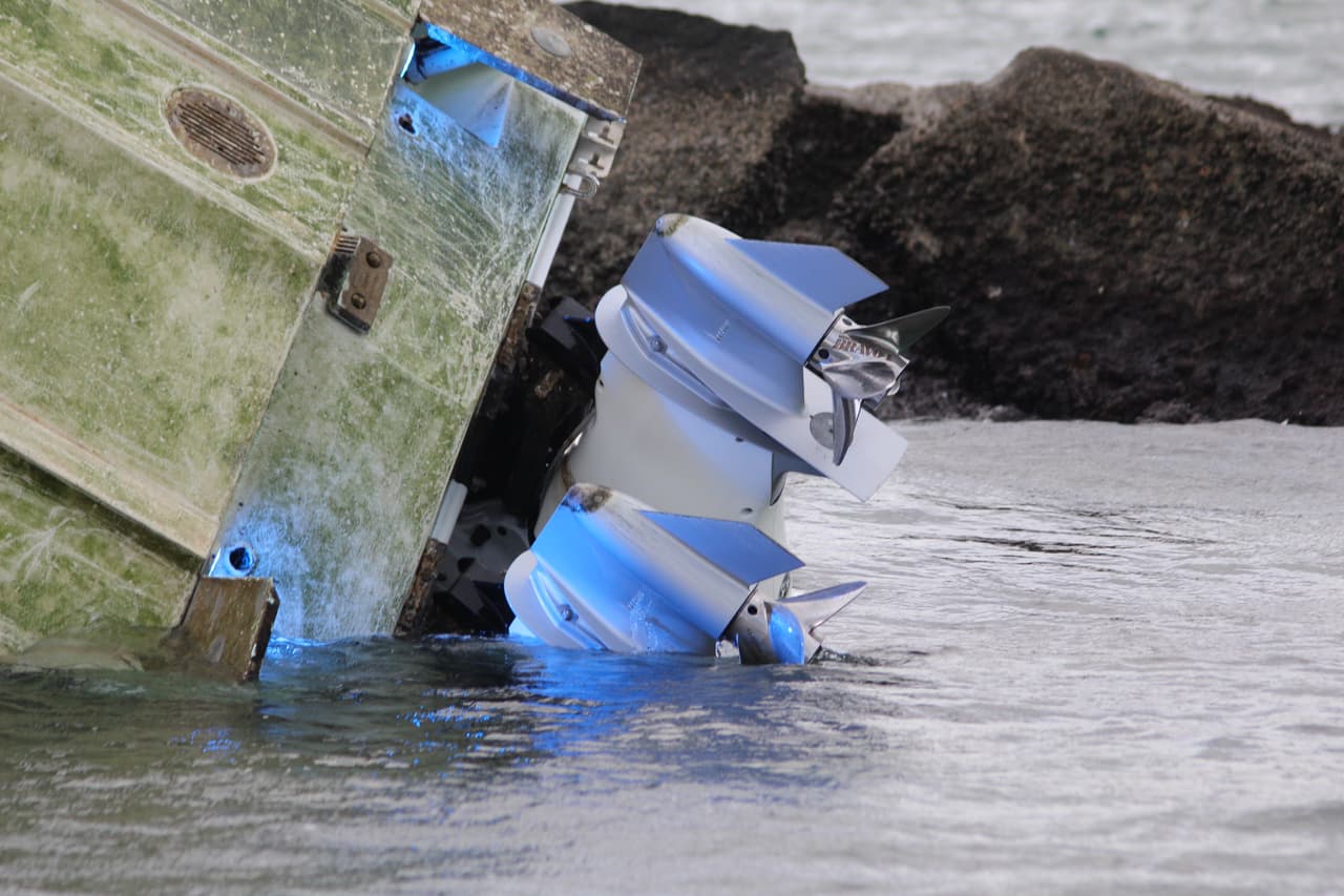 The investigation found that the boats interior blue deck lights were on possibly impairing the drivers' night vision.