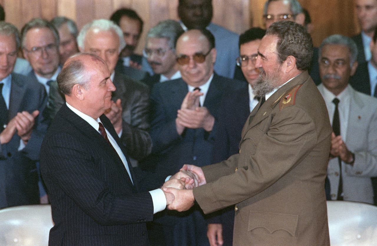 Cuban president Fidel Castro (R) and General Secretary of the Communist Party of the Soviet Union Mikhail Gorbachev (L) shake hands after signing the first "Friendship and Collaboration Treaty" in thirty years of close relations between USRR and Cuba, on April 2, 1989 in Havana. Castro resigned on February 19, 2008 as president and commander in chief of Cuba in a message published in the online version of the official daily Granma.