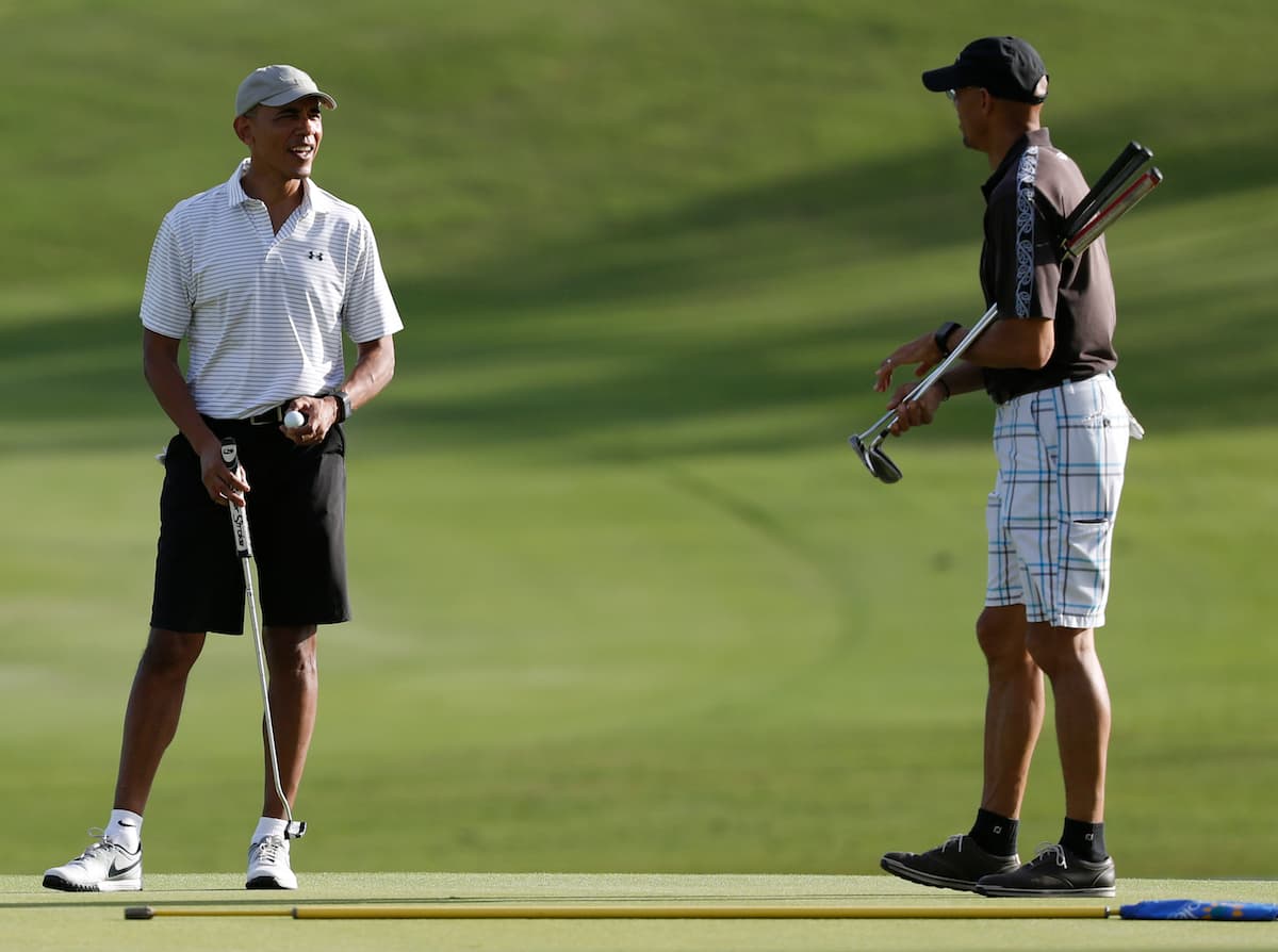 Obama con Darrell Harrington en el campo del Kapolei Golf Club, en Kapolei, Hawaii