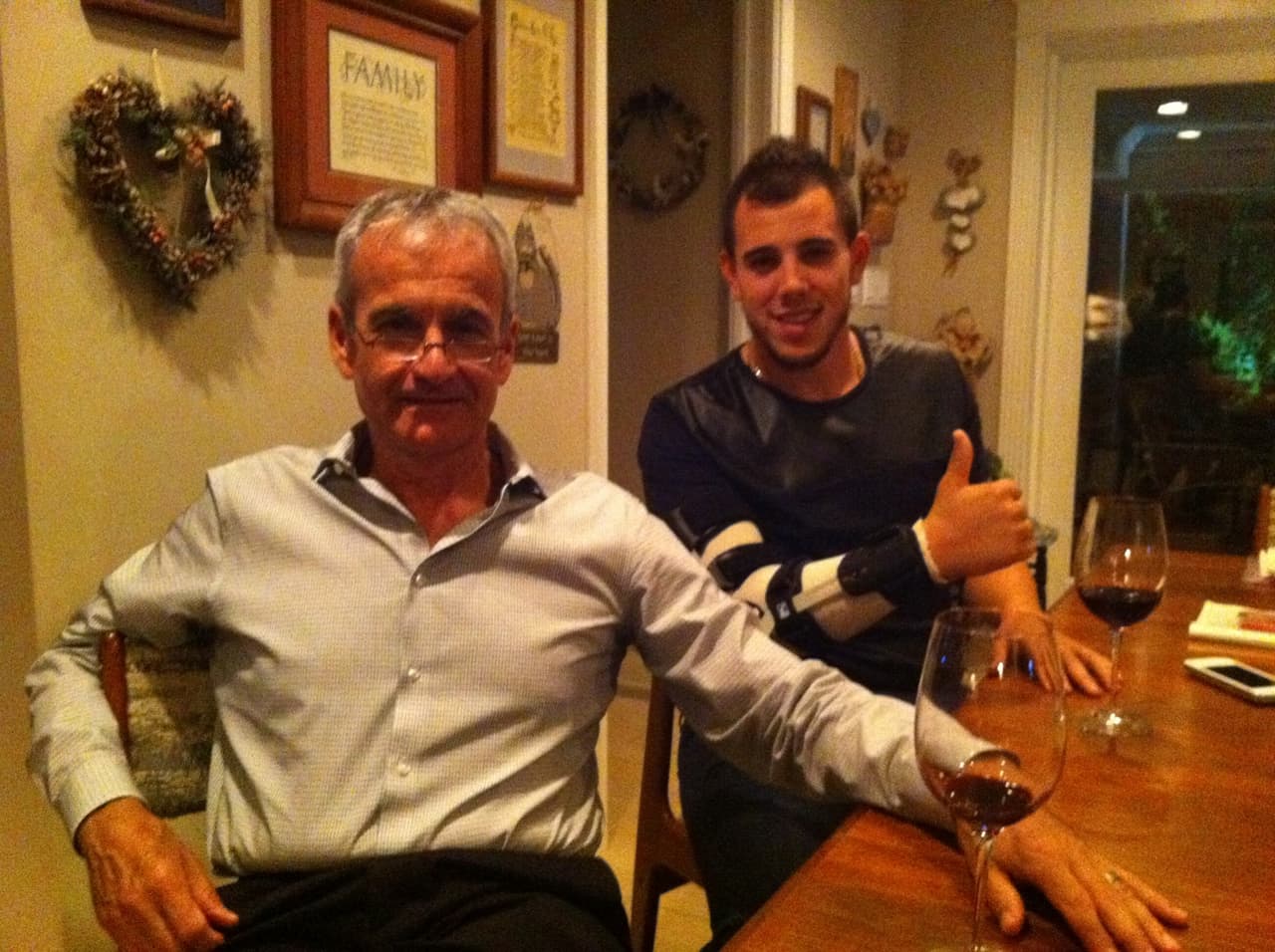 José Delfin with family attorney and close friend Ralph Fernandez. They became friends after the attorney helped restore José's eligibility to play baseball in his senior year at Alonso High in Tampa. He has represented the family pro bono ever since. Courtesy of Ralph Fernández/Univision.
