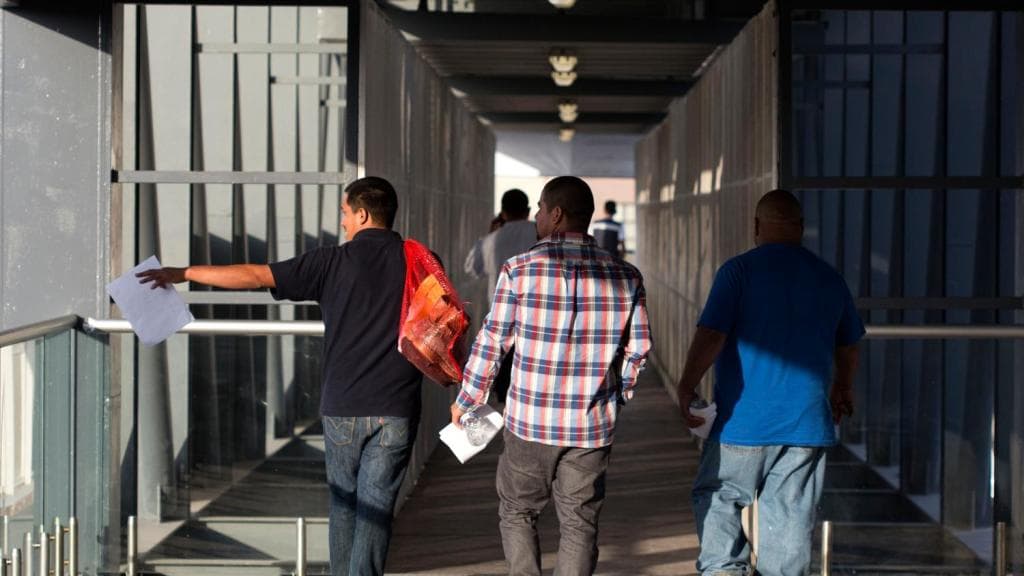 A group of men being deported to Mexico from the United States.
