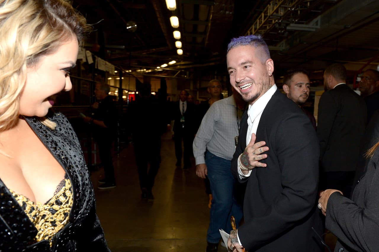 Chiquis Rivera and J Balvin greet each other at Univision's 28th Edition of Premio Lo Nuestro A La Musica Latina on February 18, 2016 in Miami, Florida.
