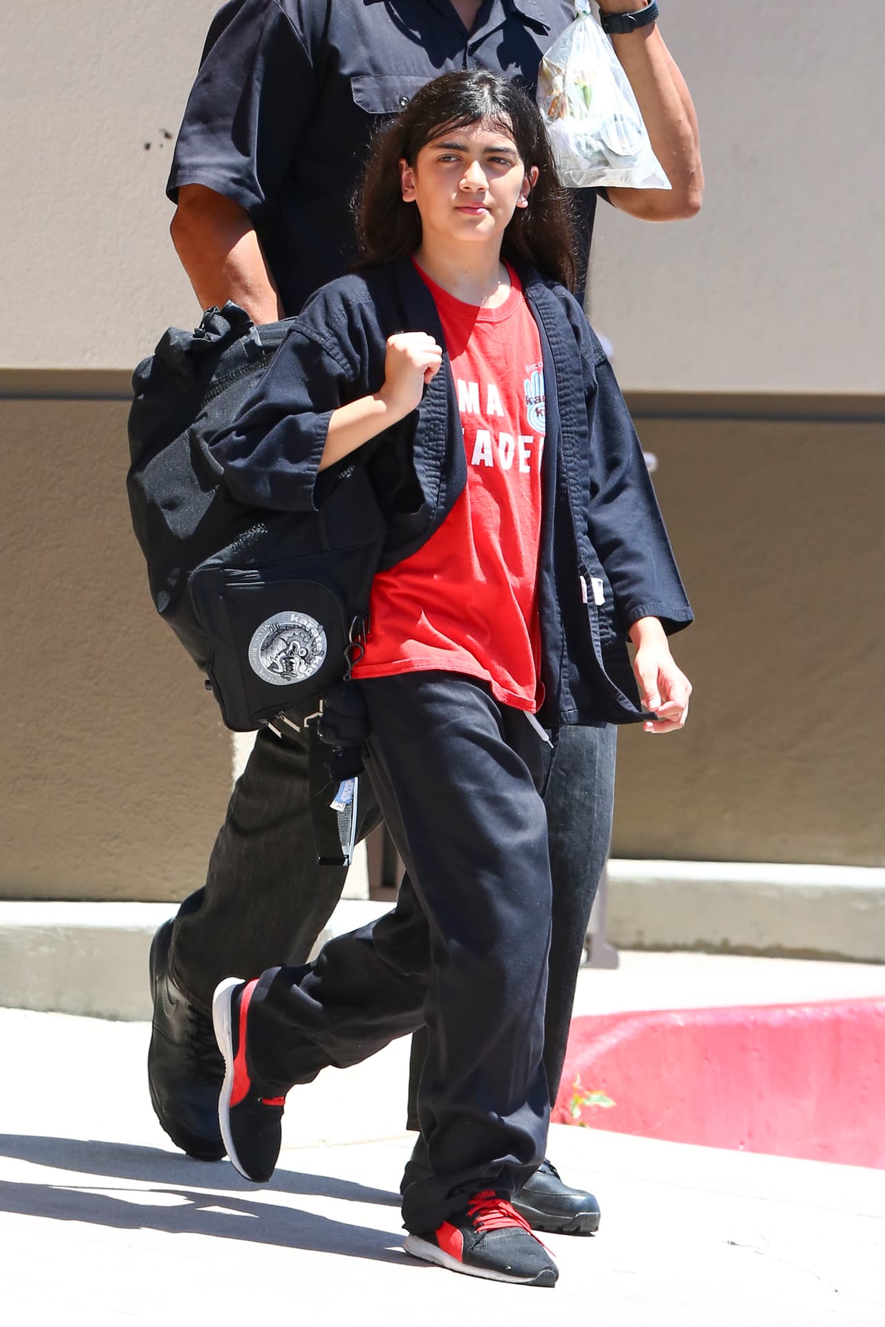 Aquí, con 13 años de edad saliendo de su clase de karate en 2015.