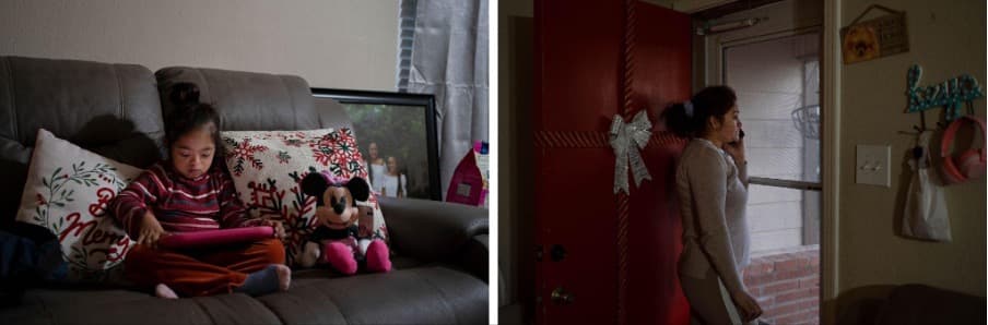 Alina Lazo ve un video mientras su madre, Cristina Lazo, mira desde la puerta de su casa, en Cloverleaf, y habla por teléfono. A veces el viento trae “olor a químico” y “se ve el polvo” que ellas están inhalando, dice Lazo.