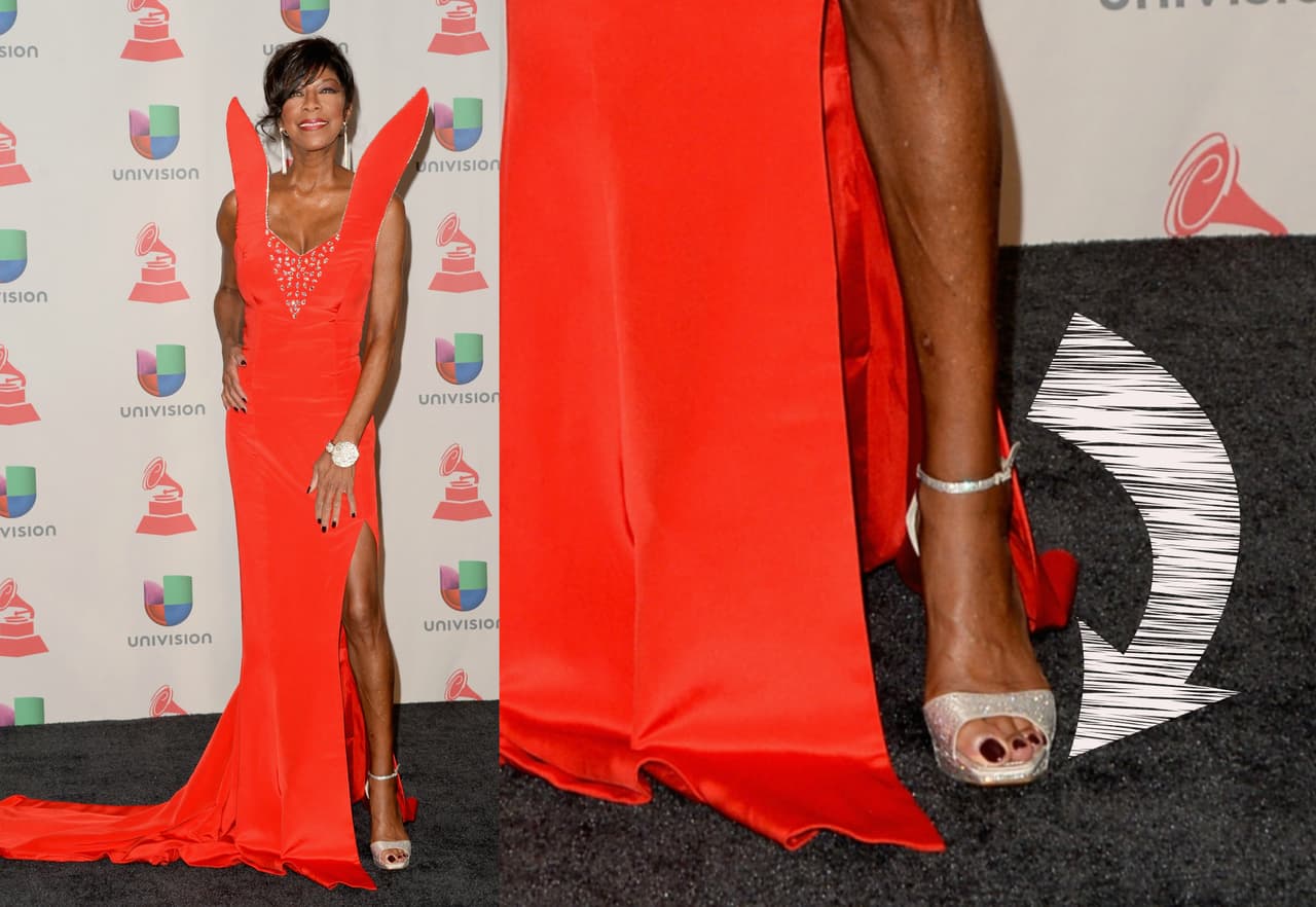 Natalie Cole asistió a la entrega de 2013 con un vestido naranja, tacones en color plata y las uñas ¿negras? Definitivamente le gustaban mucho los colores.