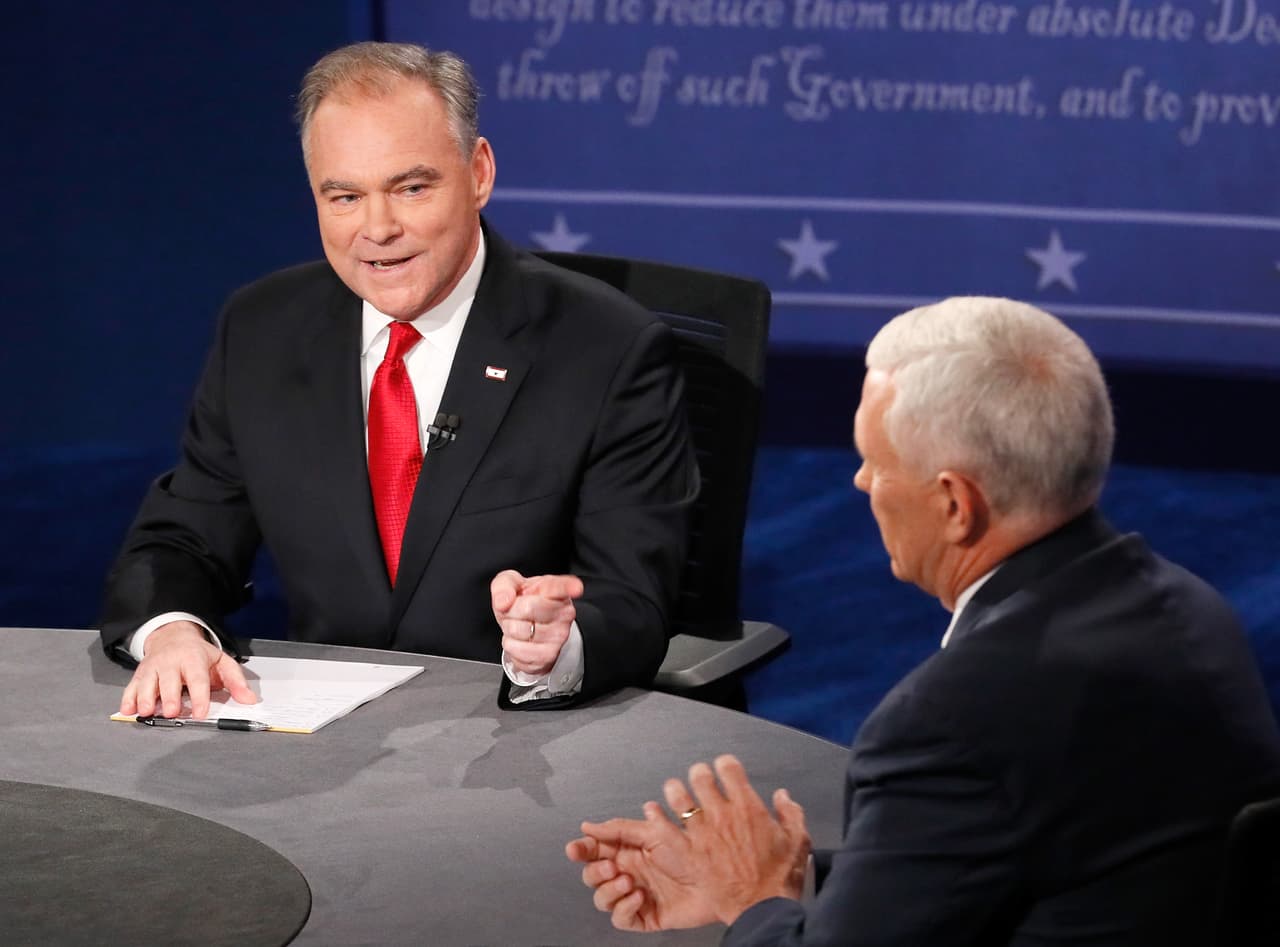FARMVILLE, VA - OCTOBER 04: Democratic vice presidential nominee Tim Kaine (L) speaks as Republican vice presidential nominee Mike Pence (R) listens during the Vice Presidential Debate at Longwood University on October 4, 2016 in Farmville, Virginia. This is the second of four debates during the presidential election season and the only debate between the vice presidential candidates. (Photo by Andrew Gombert - Pool/Getty Images)