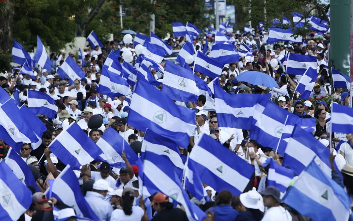 Flag-waving protesters in Managua, April 23, 2018