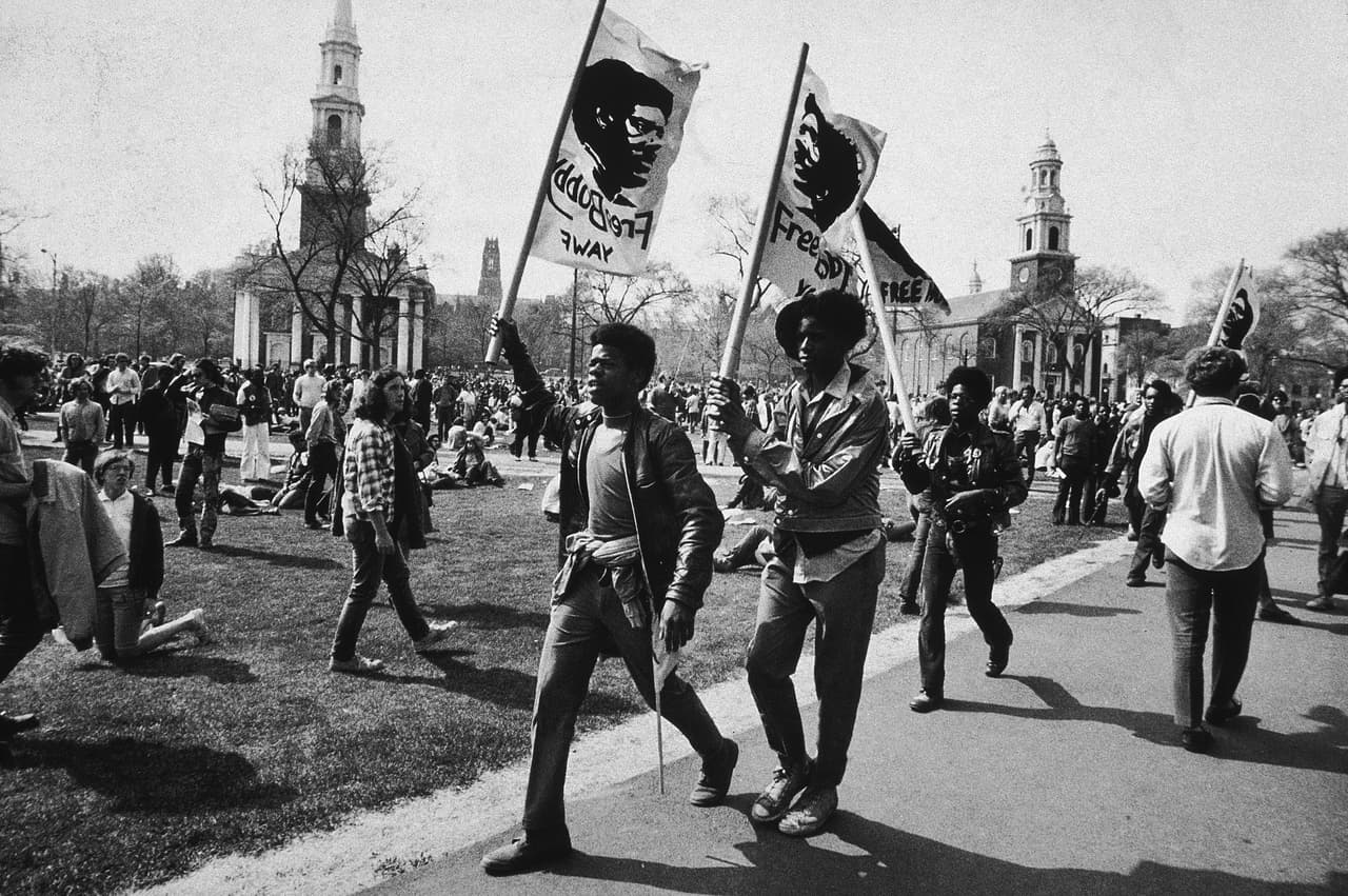 May 1970, Supporters march with flags during protest in favor of Black Panther defendants on trial for murder