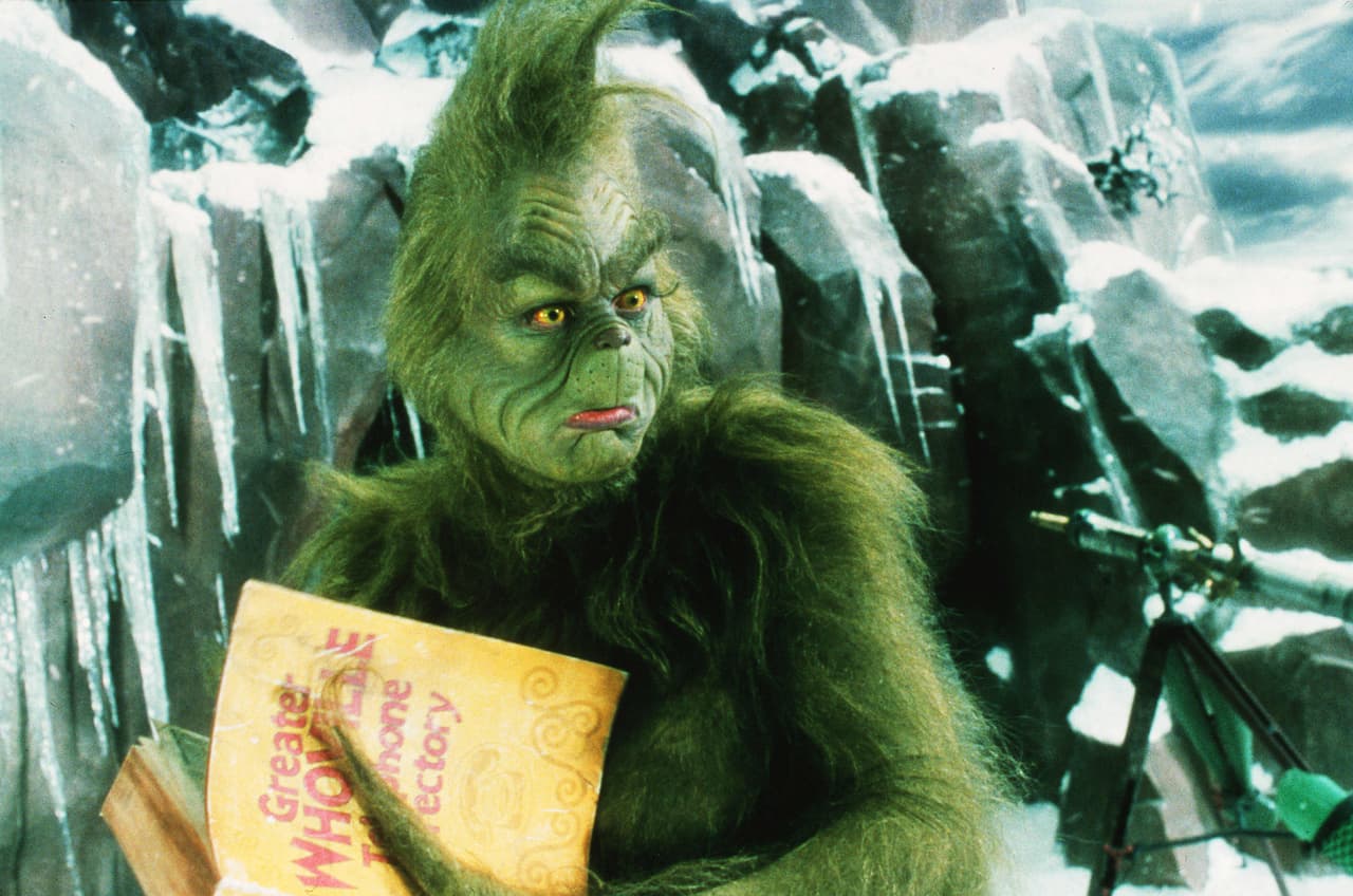 Jim Carrey con el maquillaje y vestuario del Grinch.