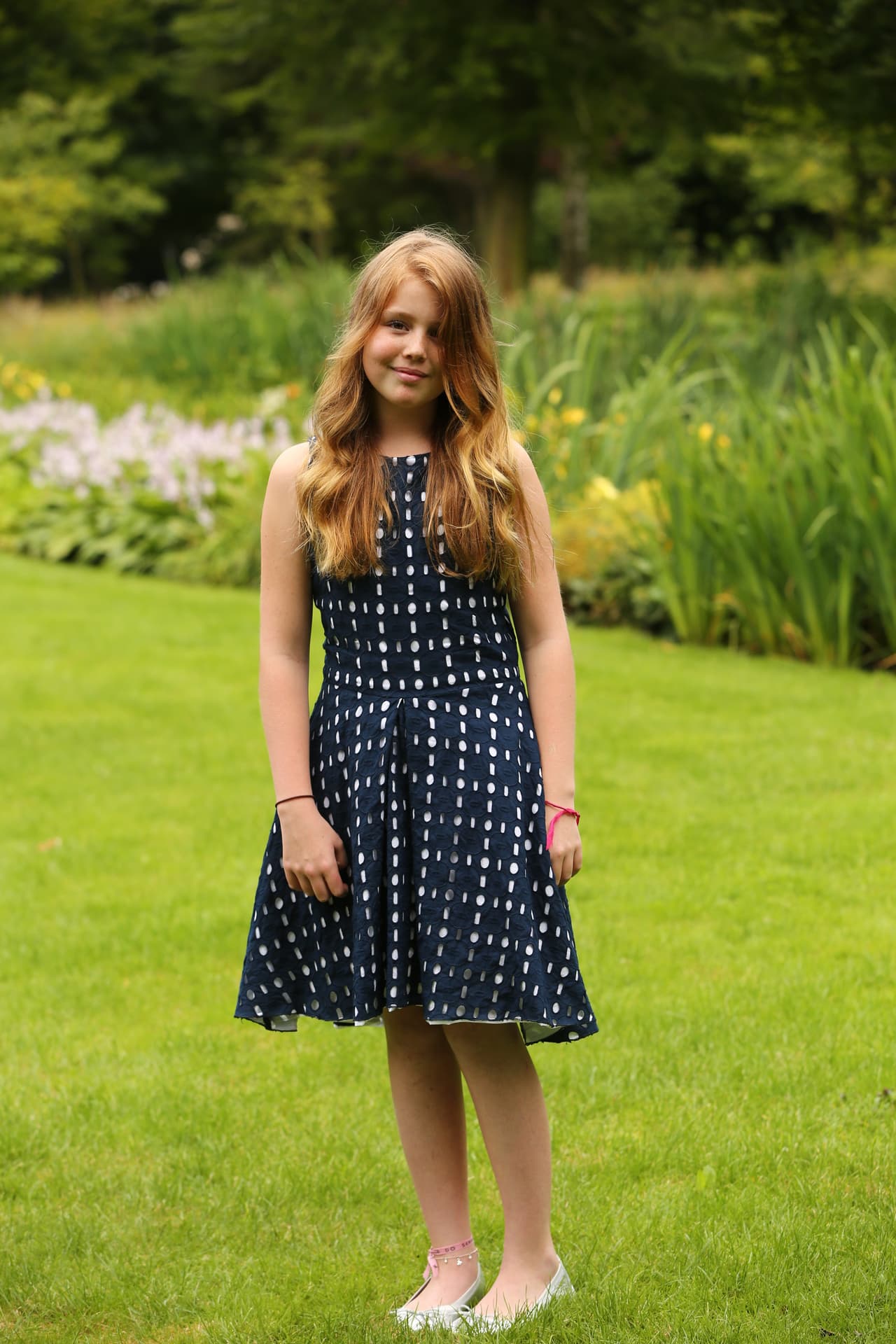 Como la mayor, ayudó a sus hermanitas a posar para la prensa de todo el mundo.