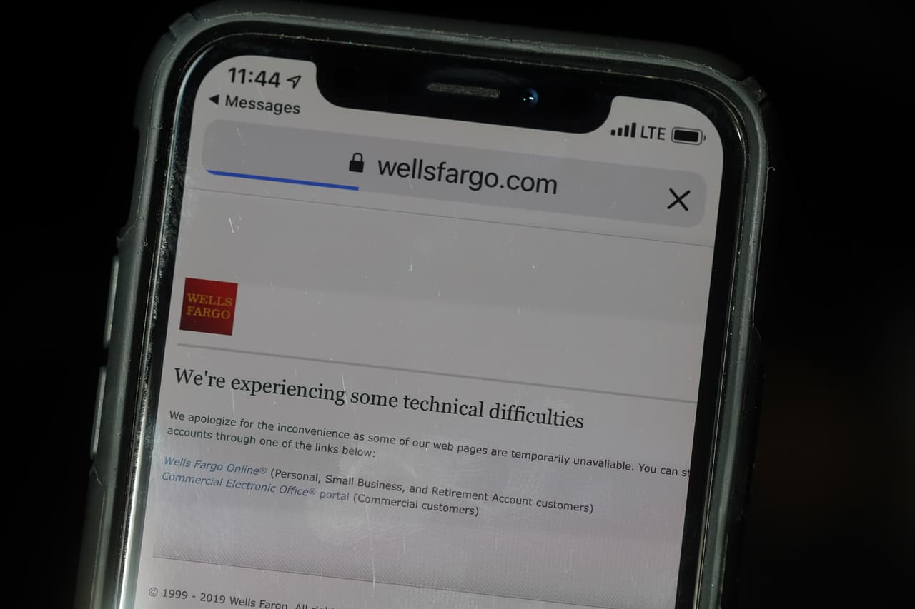 SAN FRANCISCO, CALIFORNIA - FEBRUARY 07: In this photo illustration, a message about technical difficulties appears when attempting to use the Wells Fargo phone app on February 07, 2019 in San Francisco, California. Wells Fargo customers are experiencing difficulty using ATMs and the Wells Fargo phone app after reports of a technical issue at the outage at a server farm located in Shoreview, Minnesota. (Photo Illustration by Justin Sullivan/Getty Images)