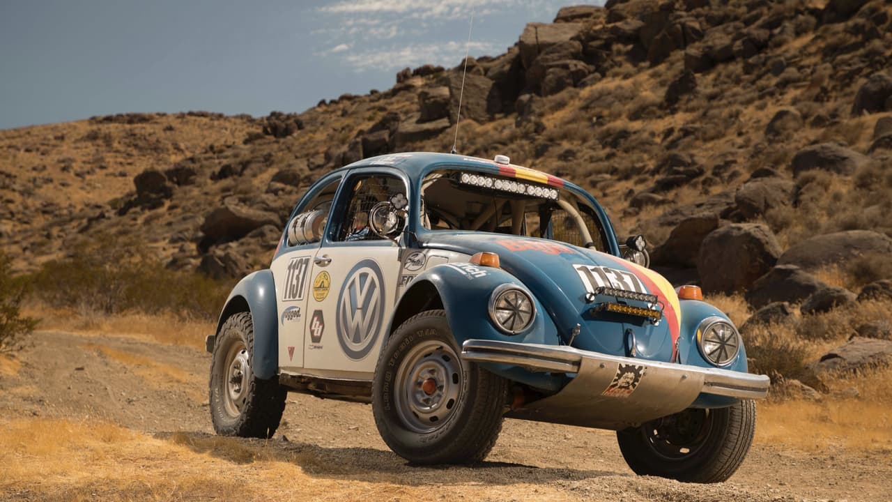 Este 
<b>Beetle 1970 apodado ‘Tope’,</b> fue el homenaje de VW a los 50 años de la Baja 1000. Cuenta con motor de 1.6 litros y modificaciones en suspensión trasera, barra de torsión, sus muelles son más rígidos, incluye amortiguadores Fox, jaula antivuelco en la cabina y se le ha adaptado un depósito de combustible de 83 litros. Cuenta con llantas BF Goodrich All Terrain de 15 pulgadas.