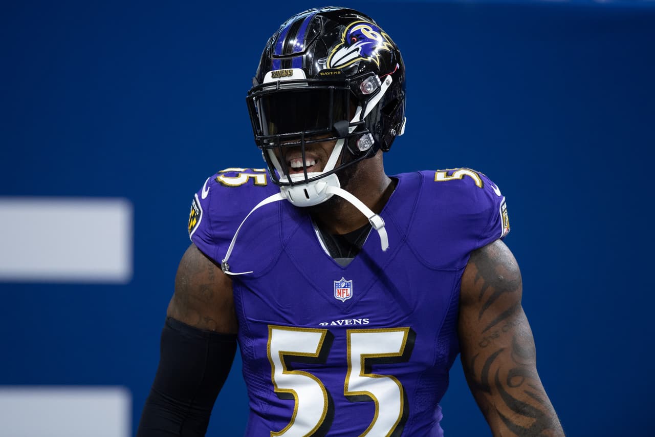 Baltimore Ravens outside linebacker Terrell Suggs (55) warms up on the field before the NFL preseason game between the Indianapolis Colts and Baltimore Ravens on August 20, 2018, at Lucas Oil Stadium in Indianapolis, IN.