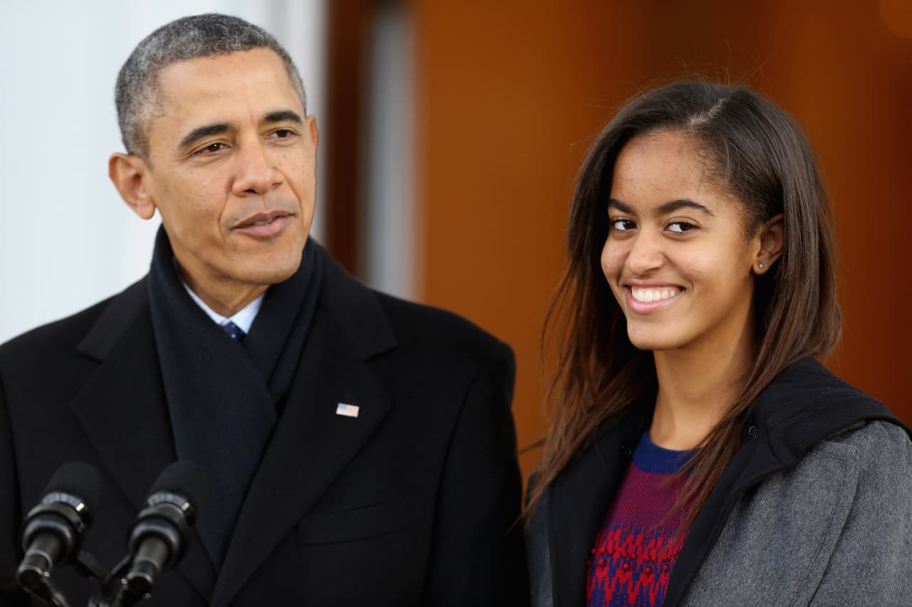 Malia Obama y Barack Obama