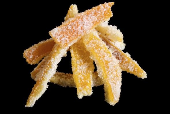 Cáscaras de naranja azucaradas. Naranja y chocolate: un sólo corazón. Estas cascaritas resultan ideales para compensar el exceso de dulce.