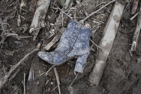 Donde casas y autos quedaron sepultados bajo casi cinco metros de lodo, piedras y ramas.