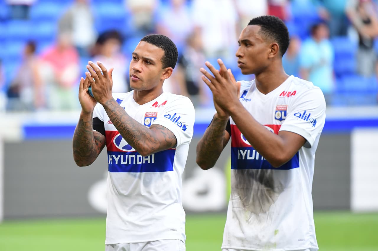(L-R) Memphis Depay of Lyon and Kenny Tete of Lyon after the Ligue 1 match between Olympique Lyonnais and FC Girondins de Bordeaux at Groupama Stadium on August 19, 2017 in Lyon, . (Photo by Dave Winter/Icon Sport)