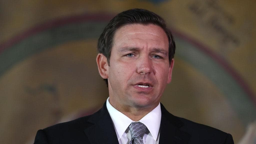 As death toll rises, Florida Governor under fire for slow response, as unemployed struggle to file claims