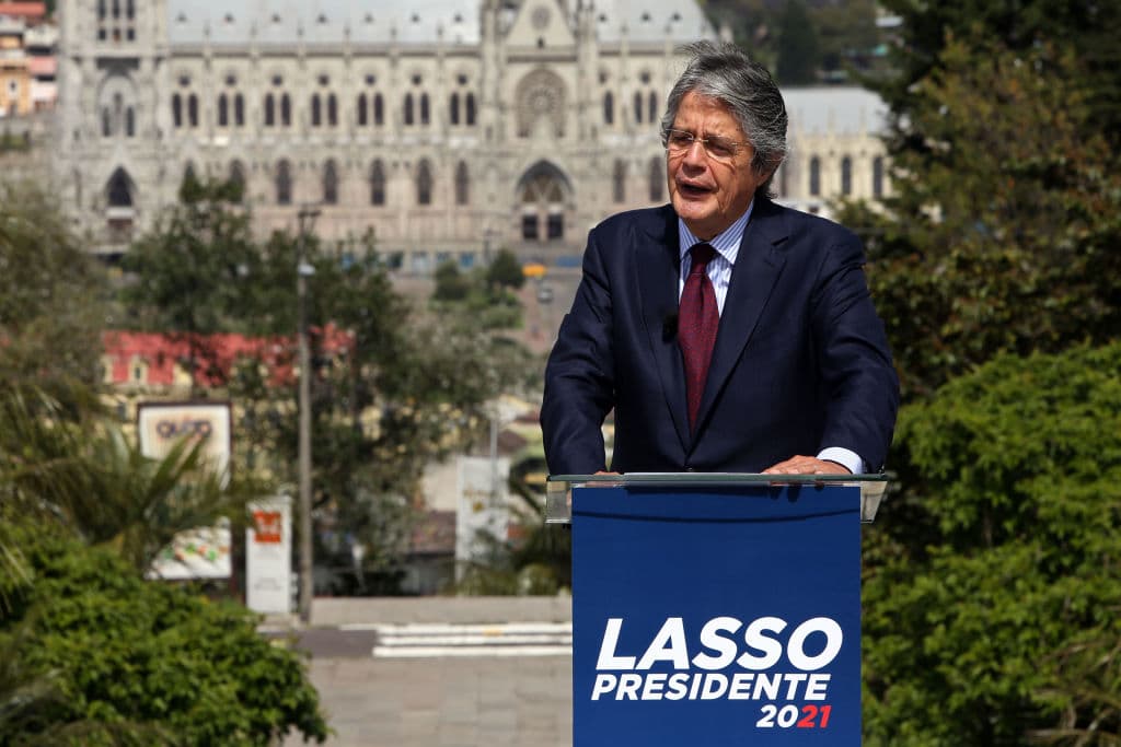 The presidential candidate of the CREO party for the Ecuadorean presidential election, Guillermo Lasso, delivers a speech during the launching of his campaign with limited capacity for the press and supporters, at Itchimbia Park in Quito, on December 31, 2020.