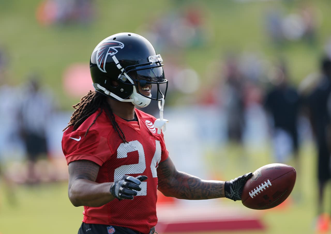 Atlanta Falcons running back Devonta Freeman (24) reacts during NFL football training camp Thursday, July 27, 2017, in Flowery Branch, Ga. (AP Photo/John Bazemore)