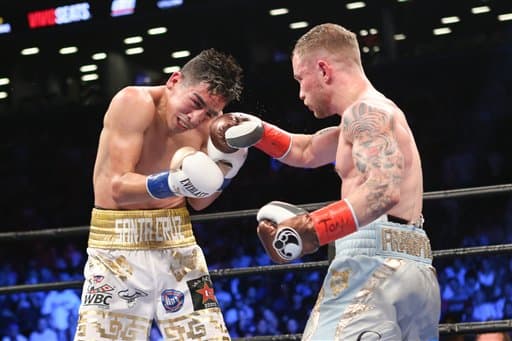 Carl Frampton venció a Leo Santa Cruz por decisión mayoritaria y le arrebató el título pluma AMB.