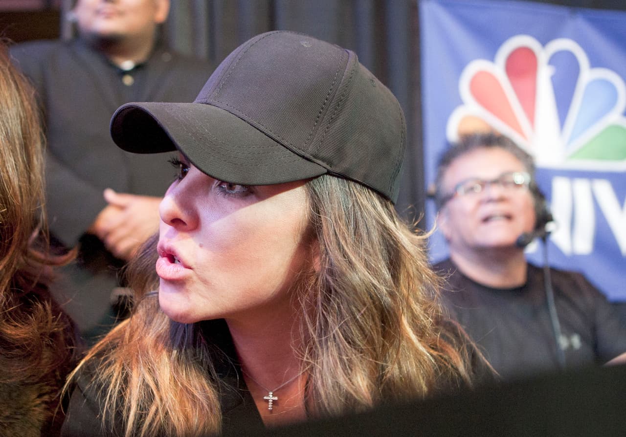 Kate lucía muy interesada en la exhibición deportiva.