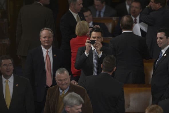 Y teniendo el presidente enfrente ¿Cómo evitar la tentación de registrar el momento con el teléfono celular?