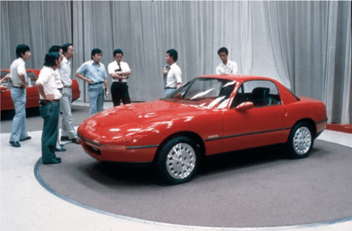 En 1985, el primer prototipo funcional terminó de ser construido (V705), fabricado en fibra de vidrio y empleando componentes de otros productos de Mazda, incluyendo el motor 1.4Lts del Mazda Familia.