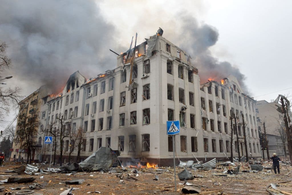 Firefighters work to contain a fire at the Economy Department building of Karazin Kharkiv National University, allegedly hit during recent shelling by Russia, on March 2, 2022.