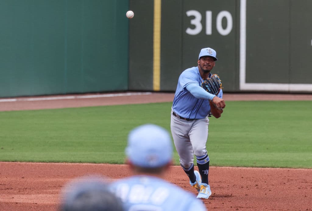 FORT MYERS, FLORIDA - MARCH 12: Wander Franco #5 of the Tampa Bay Rays makes a throw to first base in the first inning against the Boston Red Sox in a spring training game at JetBlue Park at Fenway South on March 12, 2021 in Fort Myers, Florida. (Photo by Mark Brown/Getty Images)