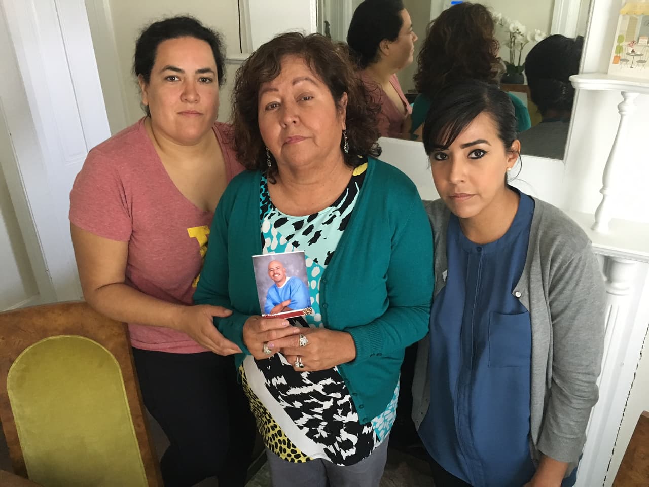 The family of David Diaz: his sisters Angela and Darlene, and his mother Yolanda.